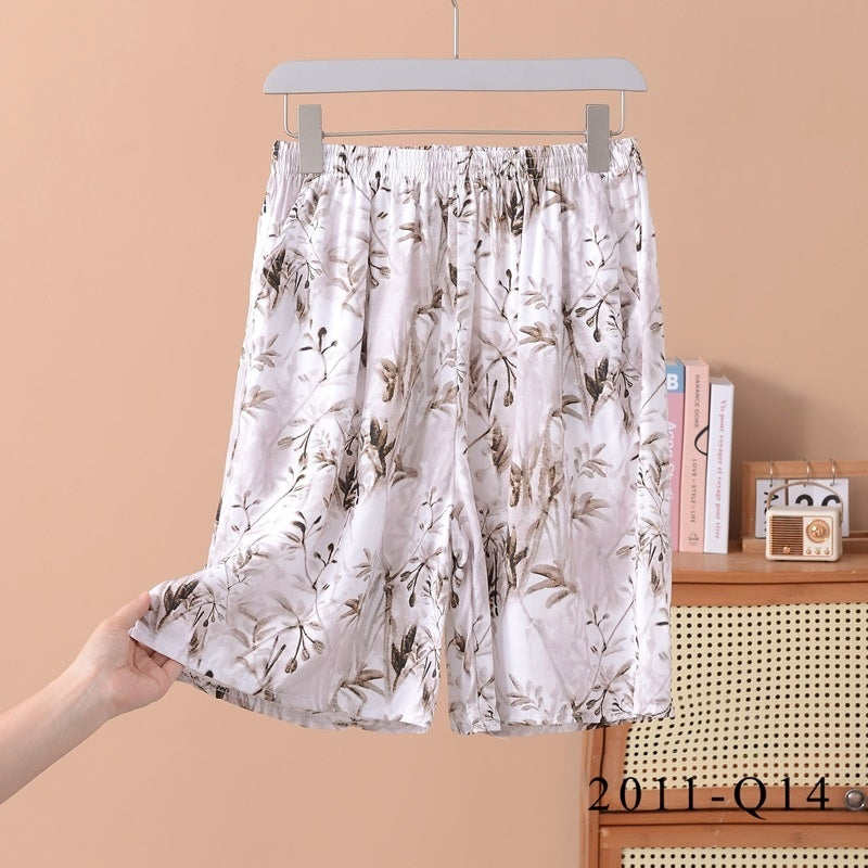 Pantalones cortos holgados de algodón y seda con estampado floral para mujer
