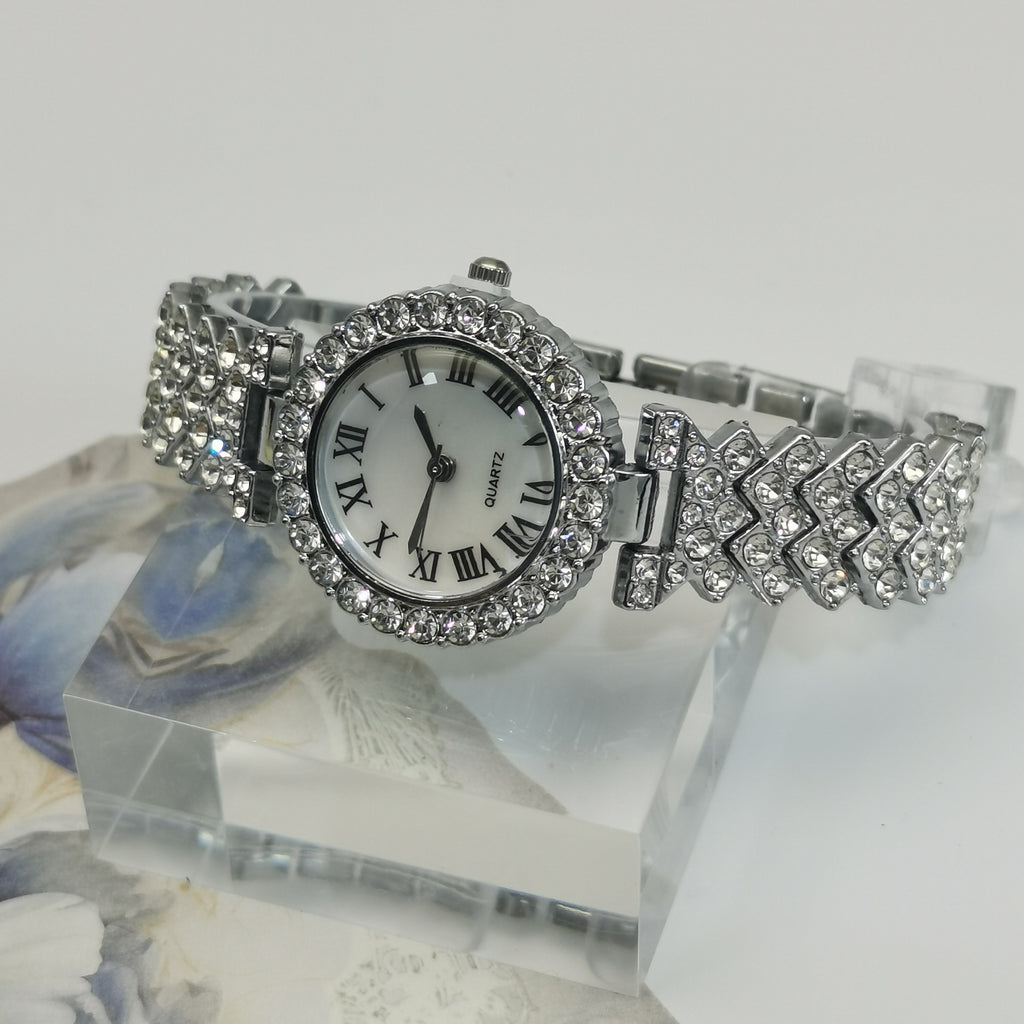 Reloj de pulsera de cuarzo con diseño de cielo estrellado y diamantes para mujer, versátil y de negocios.