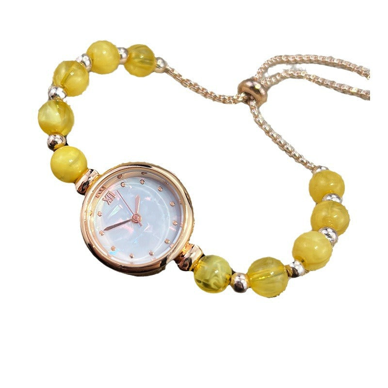 Reloj de cuarzo para mujer con pulsera de perlas, diseño lujoso y ligero, esfera pequeña y correa ajustable extraíble.