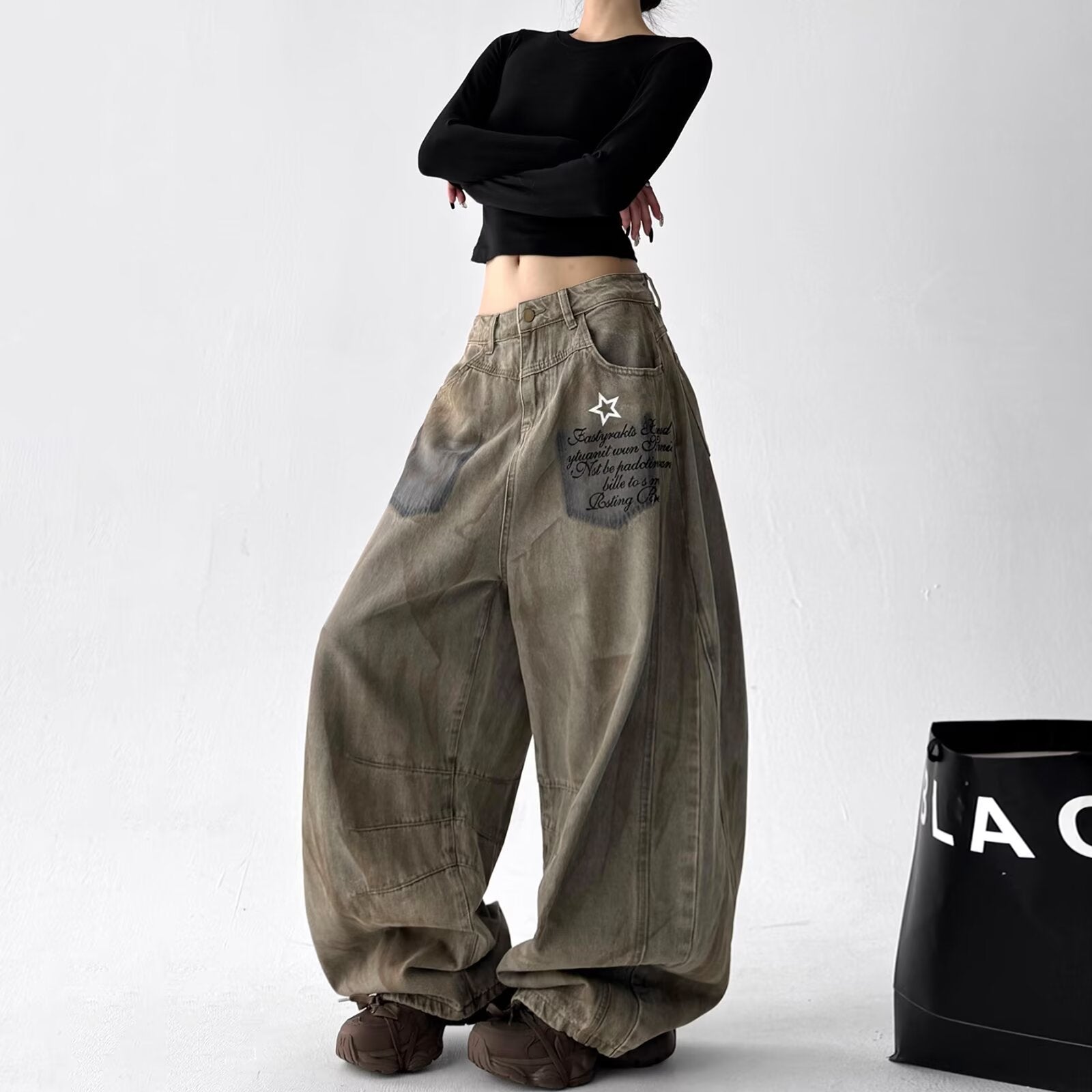 Loose-fit Wide-leg Pants With A Curved Hem For Women