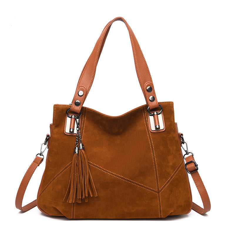 Bolso bandolera de ante con cremallera y borlas retro para mujer