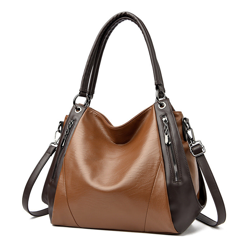 Un bolso tote de cuero suave, sencillo y versátil