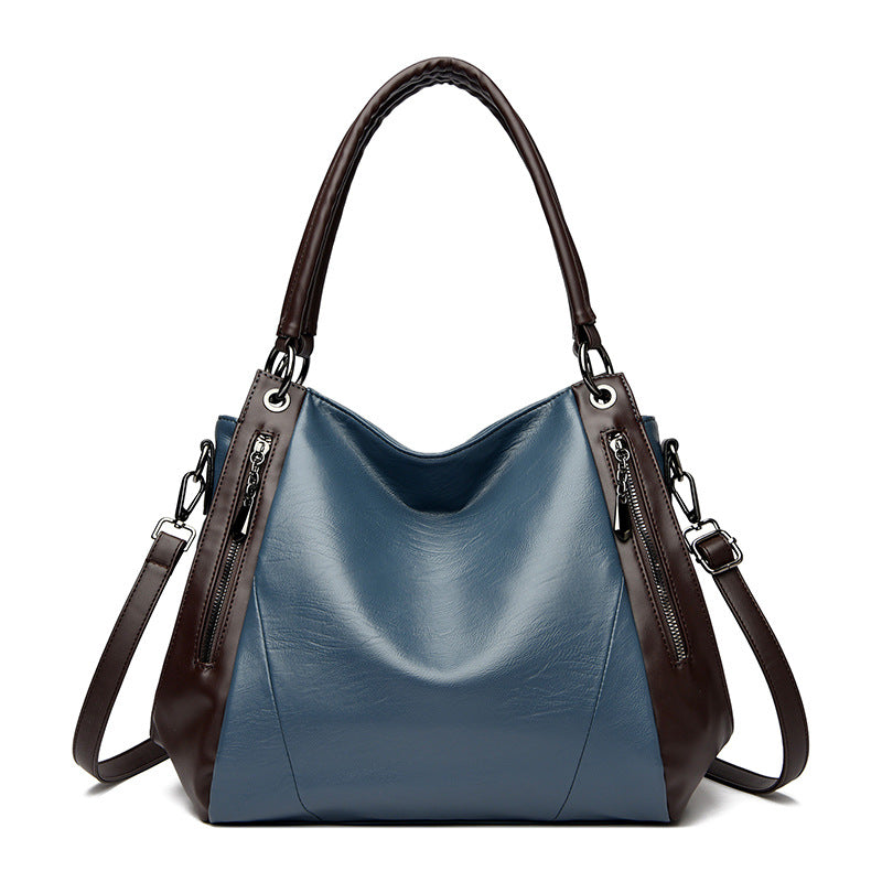 Un bolso tote de cuero suave, sencillo y versátil