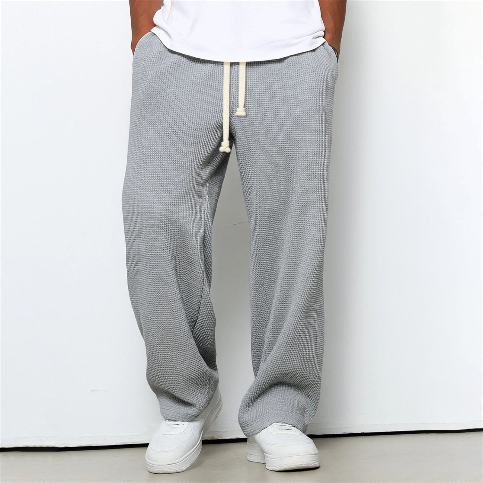 Pantalones deportivos anchos de punto gofre de corte relajado para hombre