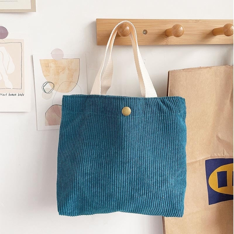 Bolso de lona minimalista de hilo grueso con estampados a doble cara. Un bolso de lona versátil y de gran capacidad para mujer.