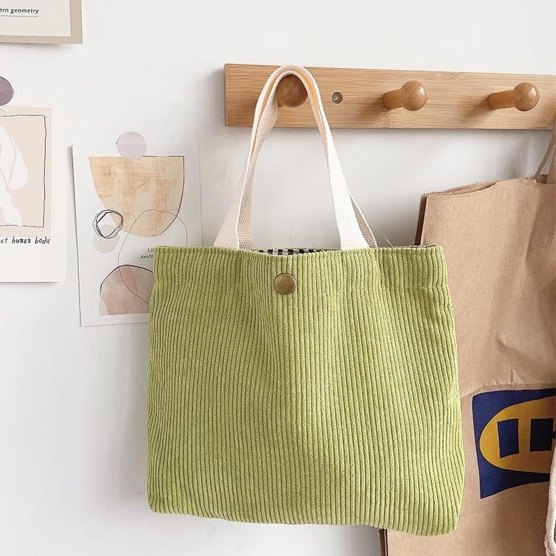 Bolso de lona minimalista de hilo grueso con estampados a doble cara. Un bolso de lona versátil y de gran capacidad para mujer.