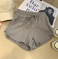Pantalones de yoga para mujer, versátiles, de pierna ancha y con múltiples combinaciones, en colores lisos.
