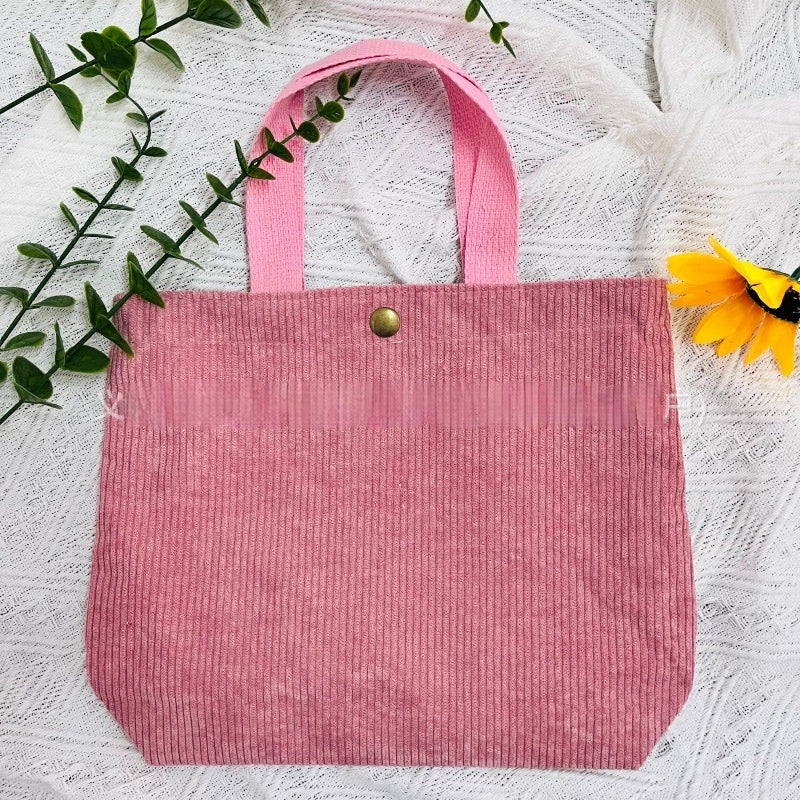 Bolso de lona minimalista de hilo grueso con estampados a doble cara. Un bolso de lona versátil y de gran capacidad para mujer.