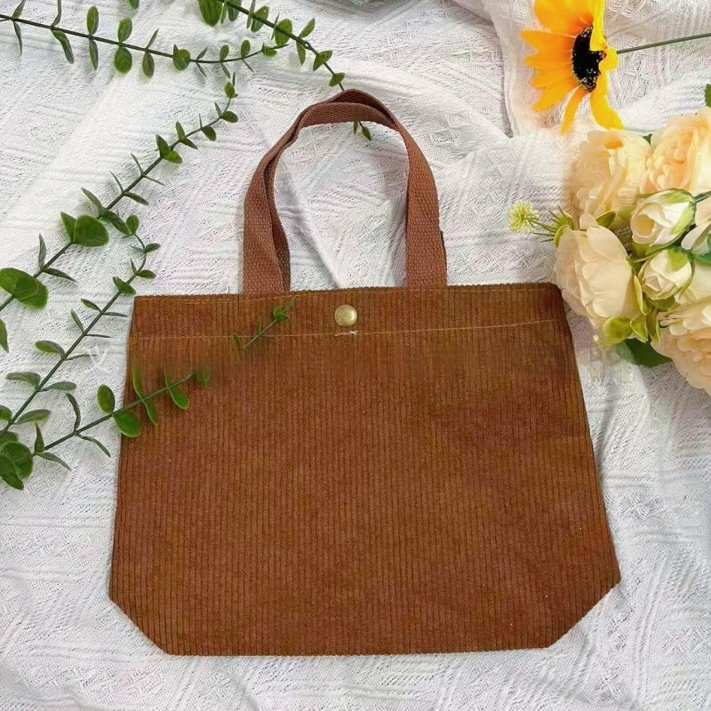 Bolso de lona minimalista de hilo grueso con estampados a doble cara. Un bolso de lona versátil y de gran capacidad para mujer.