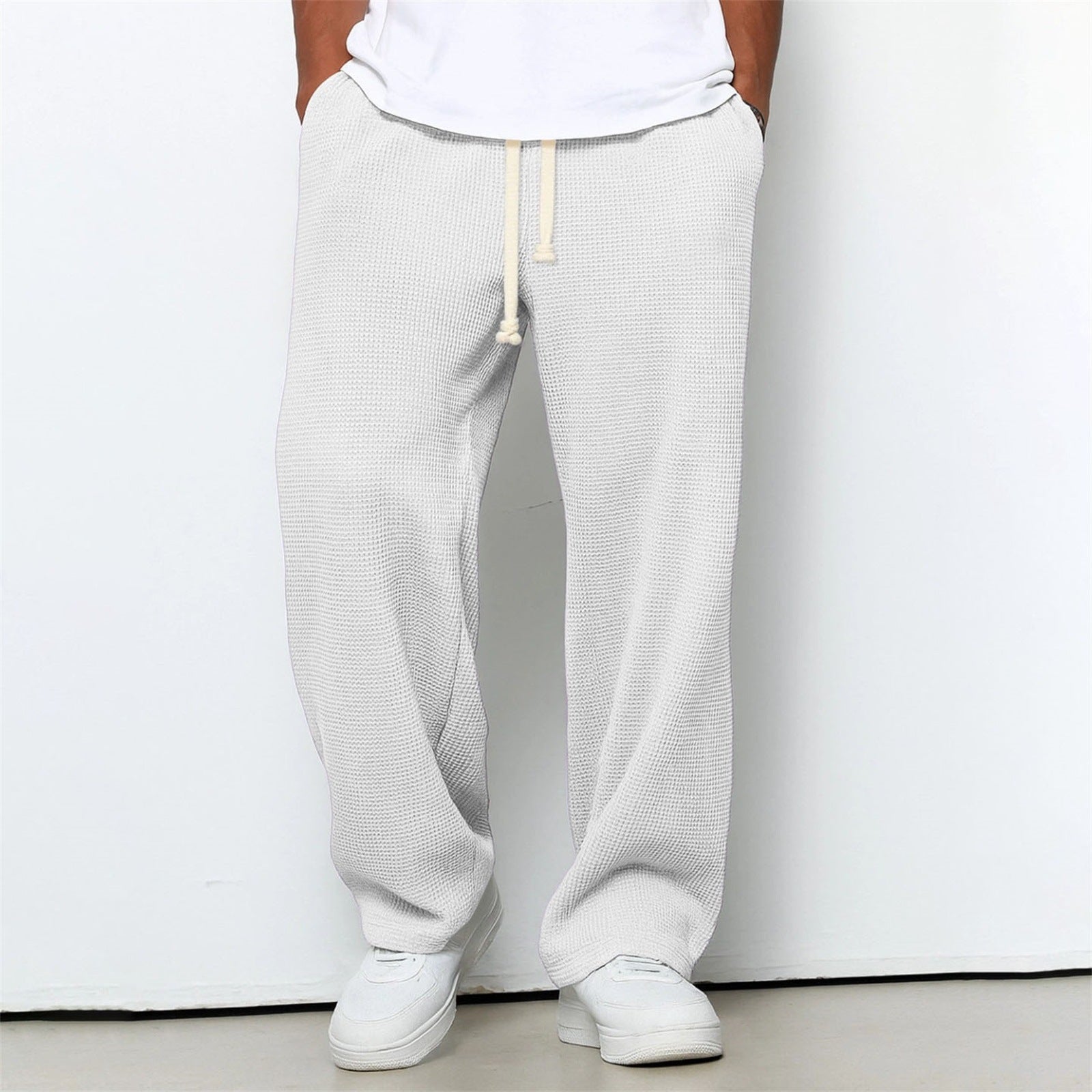 Pantalones deportivos anchos de punto gofre de corte relajado para hombre