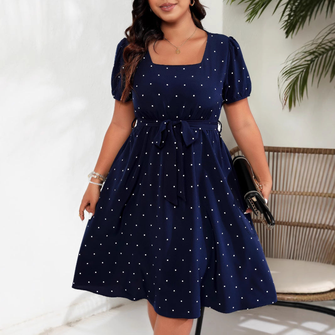 Elegante vestido retro de lunares con cintura ceñida para mujer