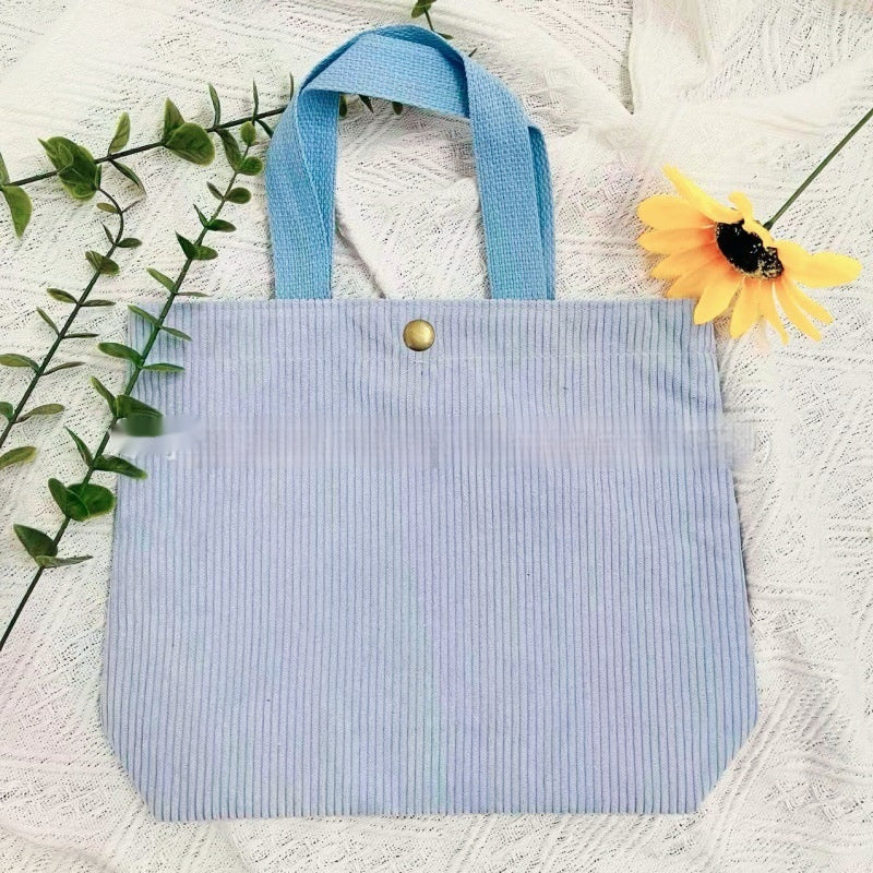 Bolso de lona minimalista de hilo grueso con estampados a doble cara. Un bolso de lona versátil y de gran capacidad para mujer.