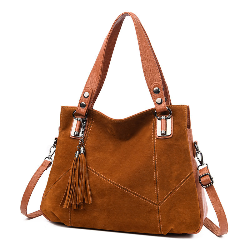 Bolso bandolera de ante con cremallera y borlas retro para mujer