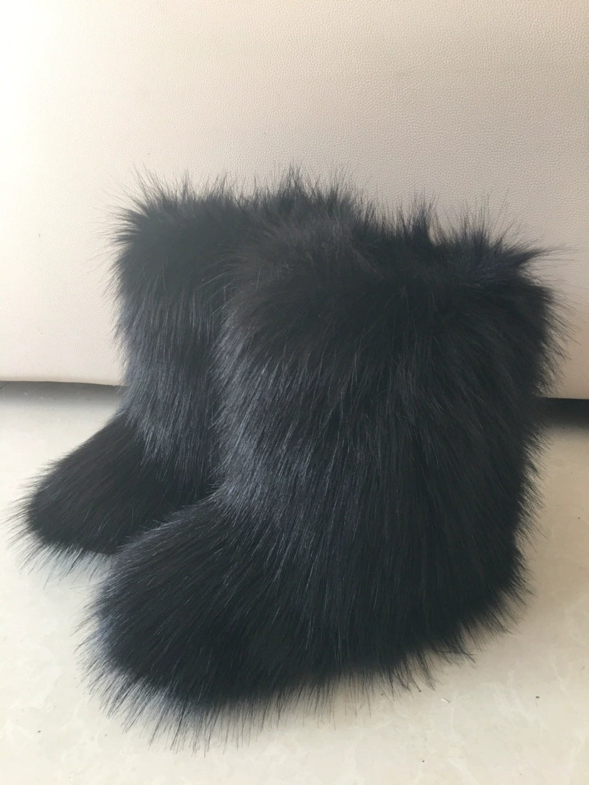 Botas de nieve de piel de zorro y perro mapache