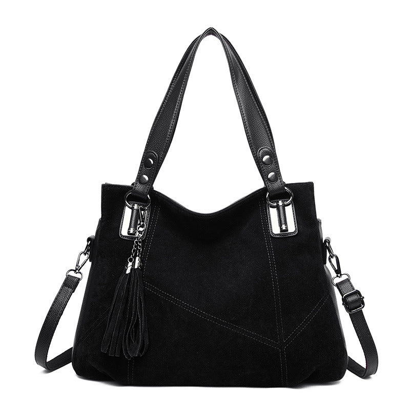 Bolso bandolera de ante con cremallera y borlas retro para mujer