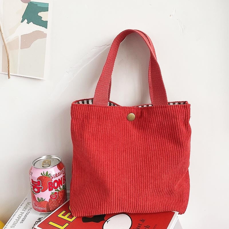 Bolso de lona minimalista de hilo grueso con estampados a doble cara. Un bolso de lona versátil y de gran capacidad para mujer.