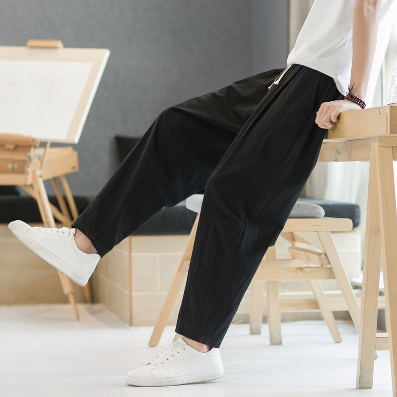 Pantalones casuales de corte recto y holgados de algodón y lino para hombre