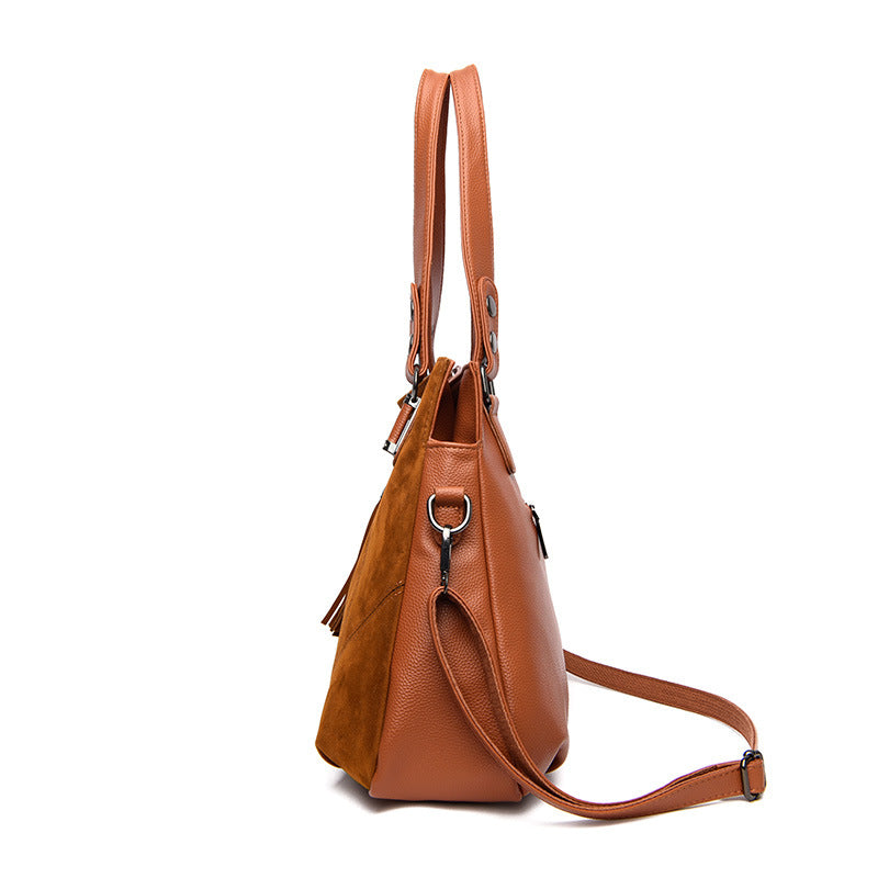 Bolso bandolera de ante con cremallera y borlas retro para mujer