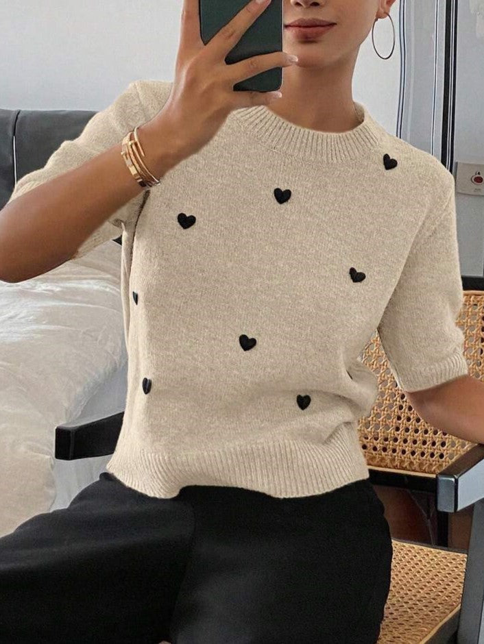 Suéter de punto jacquard con cuello redondo y corazón para mujer