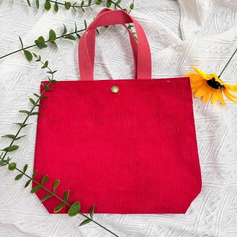 Bolso de lona minimalista de hilo grueso con estampados a doble cara. Un bolso de lona versátil y de gran capacidad para mujer.
