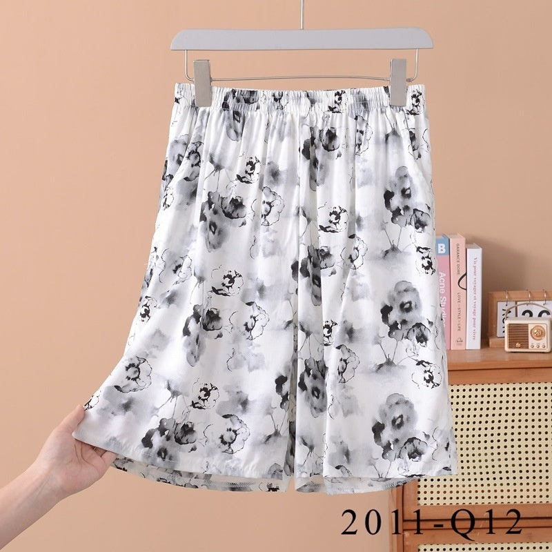 Pantalones cortos holgados de algodón y seda con estampado floral para mujer