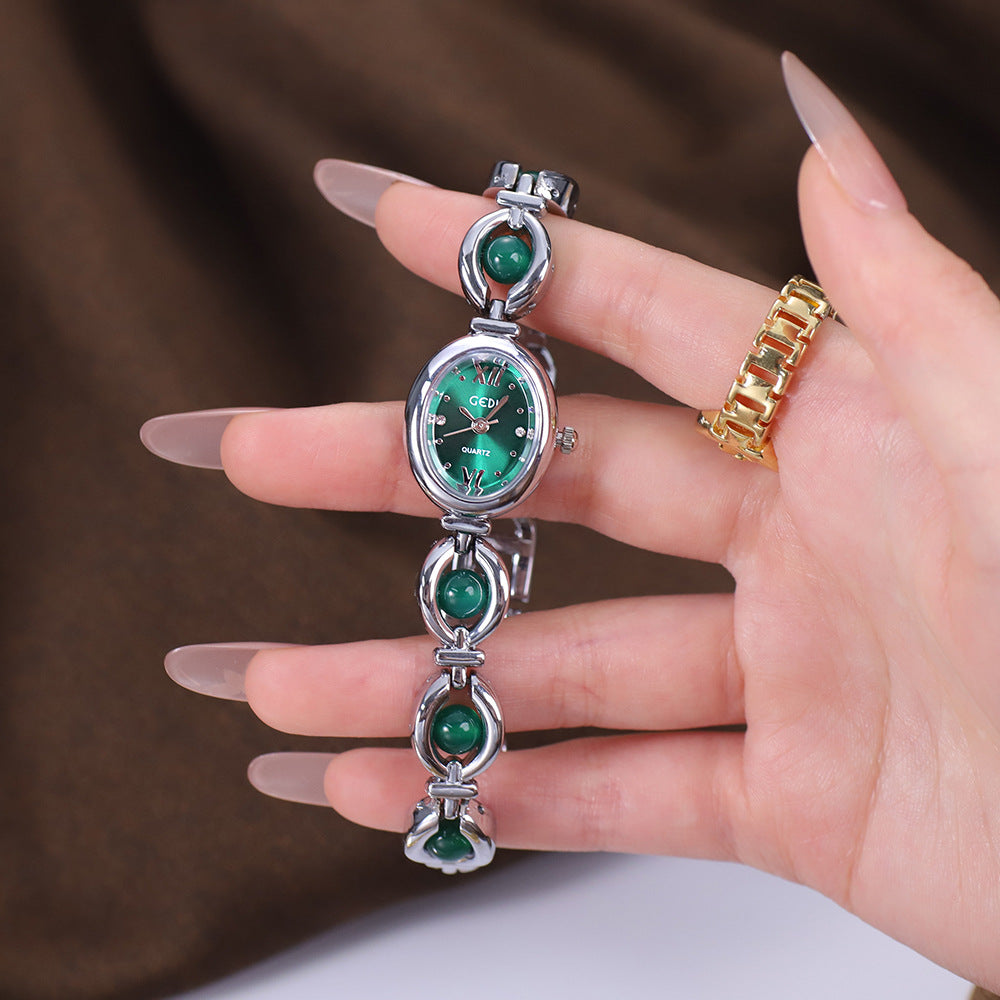 Reloj de pulsera Gedi de estilo nacional con esmeralda, atractivo, de nicho, de alta calidad, ligero, de lujo, con perlas de concha, exquisito reloj de cuarzo para mujer.