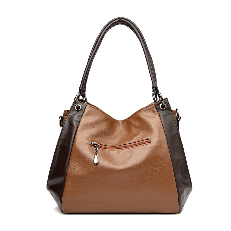 Un bolso tote de cuero suave, sencillo y versátil