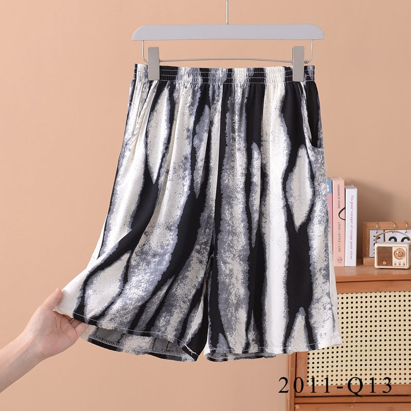 Pantalones cortos holgados de algodón y seda con estampado floral para mujer