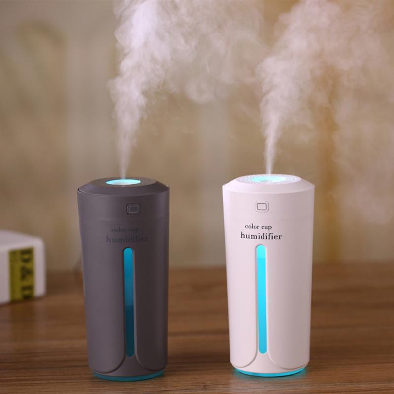 Mini humidificador de aire USB ultrasónico para coche, difusor de aroma eléctrico de aceites esenciales, taza con luces LED de 7 colores.