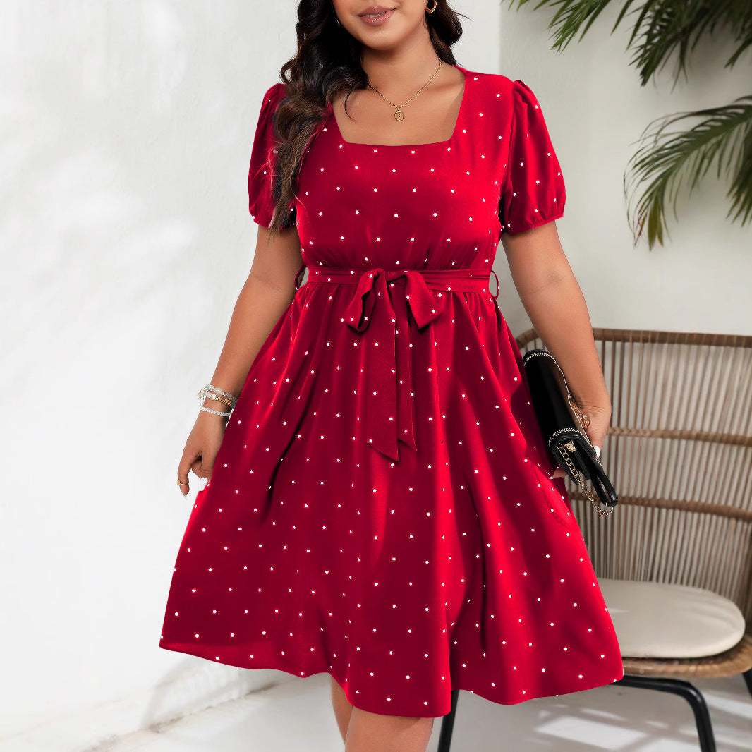 Elegante vestido retro de lunares con cintura ceñida para mujer