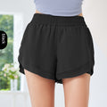 Pantalones cortos deportivos y de fitness de secado rápido de malla color melocotón