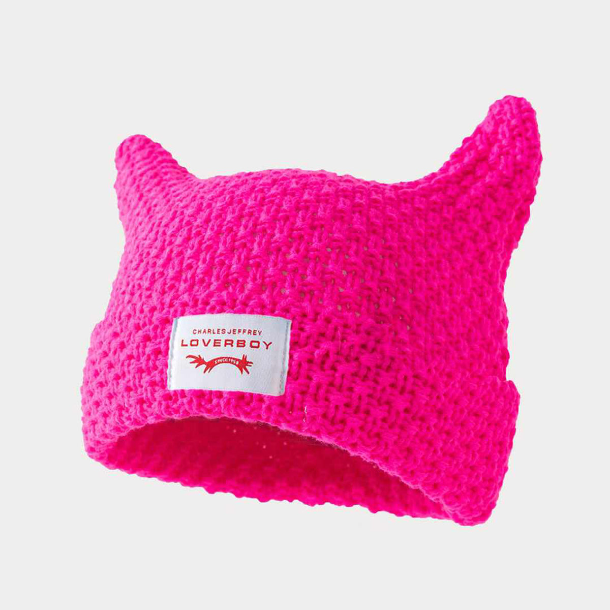 Gorro de punto a rayas hecho a mano con lindas orejas de gato, informal y cálido.