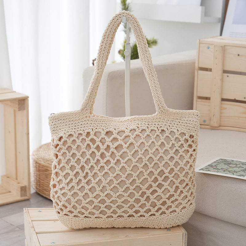 Bolso de mano informal de paja tejido a mano