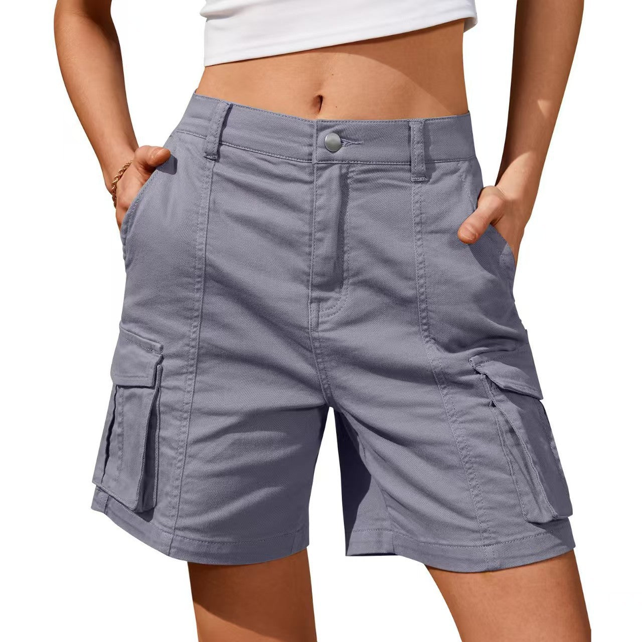 Pantalones casuales de color liso para mujer con bolsillos y botones tridimensionales