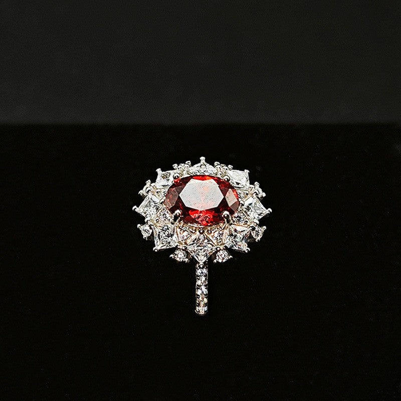 Silver Ring With An Adjustable Opening Featuring A Pigeons Blood Red High carat Zircon