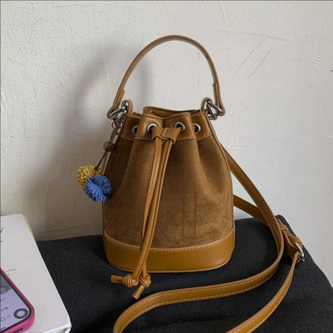 Bolso tipo cubo con asa de cordón para mujer