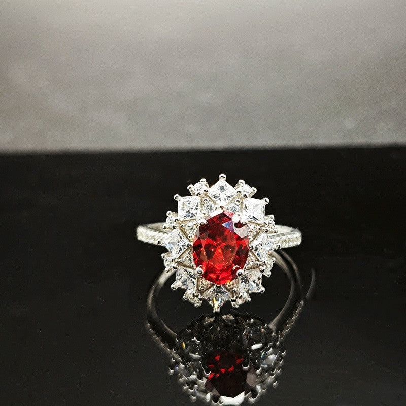 Silver Ring With An Adjustable Opening Featuring A Pigeons Blood Red High carat Zircon