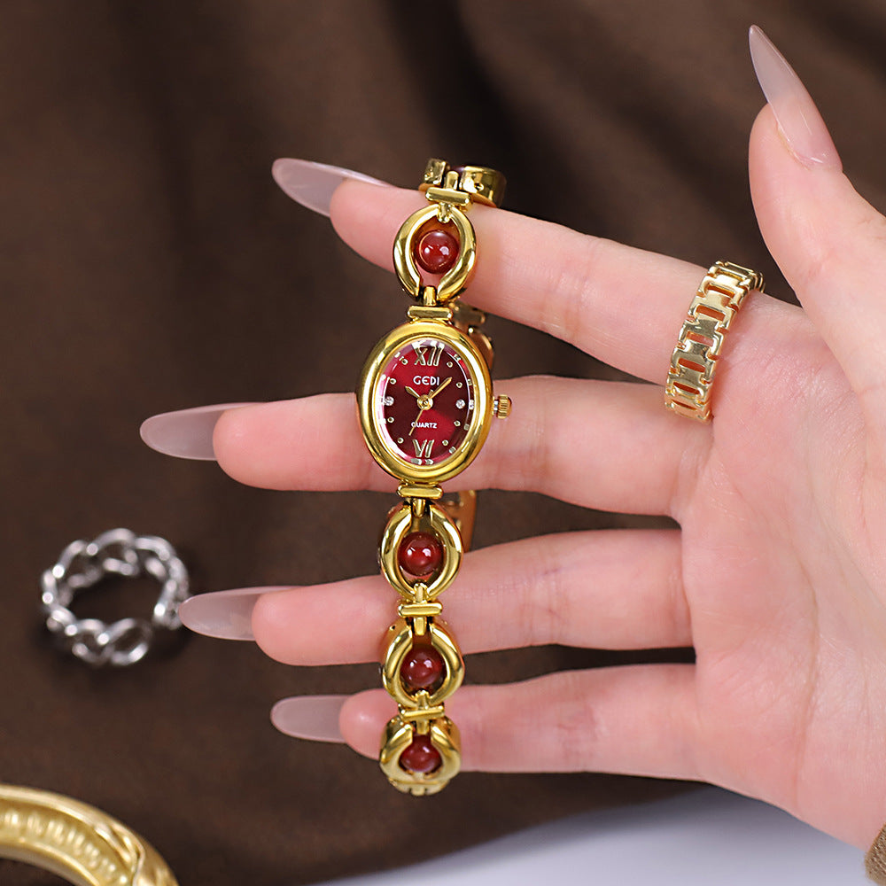 Reloj de pulsera Gedi de estilo nacional con esmeralda, atractivo, de nicho, de alta calidad, ligero, de lujo, con perlas de concha, exquisito reloj de cuarzo para mujer.