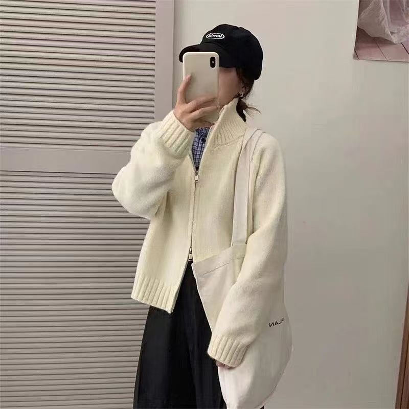 Cárdigan de punto holgado, sencillo, con cuello alto y estilo relajado