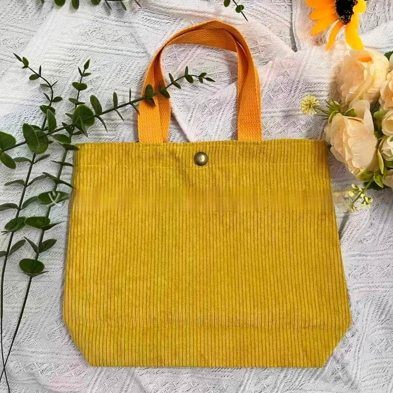 Bolso de lona minimalista de hilo grueso con estampados a doble cara. Un bolso de lona versátil y de gran capacidad para mujer.