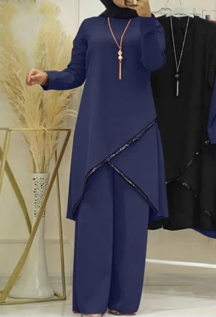 Traje informal de mujer con camisa de manga larga y cuello redondo y pantalones de pierna ancha