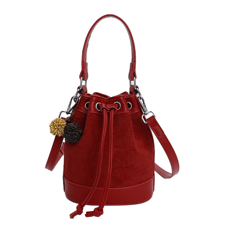 Bolso tipo cubo con asa de cordón para mujer