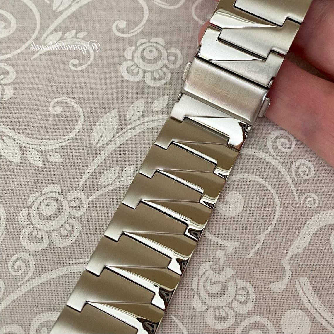 Correa de acero inoxidable para iluminación Dumb Room
