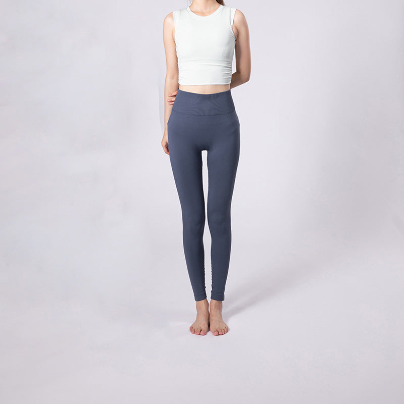 Pantalones de yoga de cintura alta con control de abdomen y levantamiento de glúteos en colores lisos