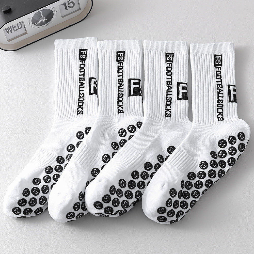 Calcetines deportivos para hombre con adhesivo de puntos de nailon para un agarre antideslizante.
