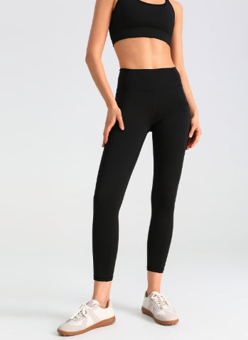 Leggings deportivos elásticos de malla con bolsillos laterales