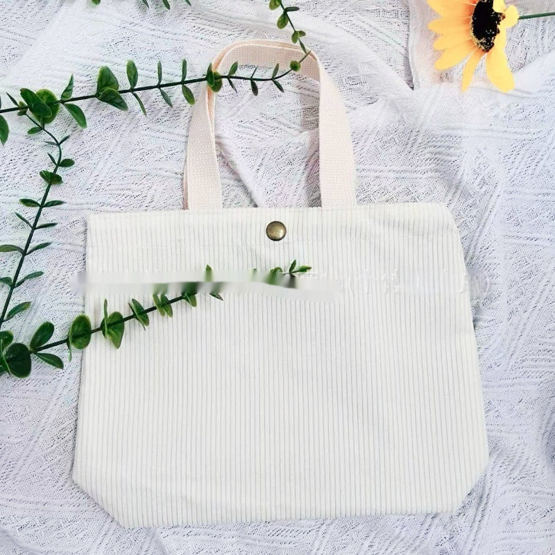 Bolso de lona minimalista de hilo grueso con estampados a doble cara. Un bolso de lona versátil y de gran capacidad para mujer.