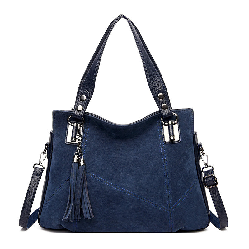 Bolso bandolera de ante con cremallera y borlas retro para mujer
