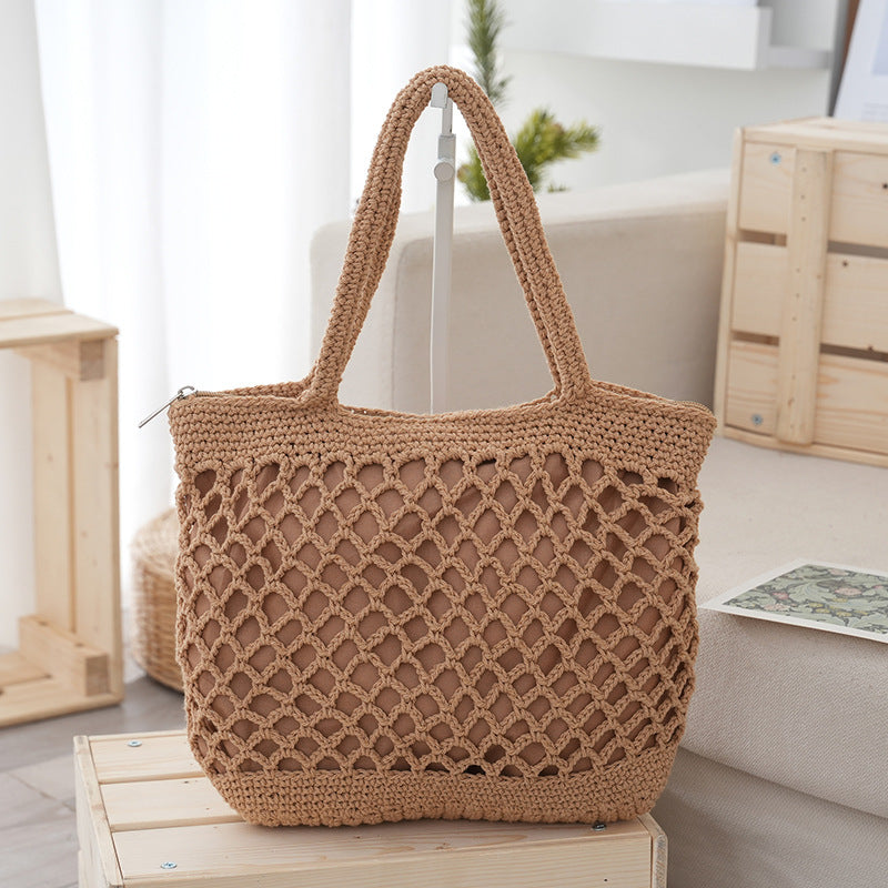 Bolso de mano informal de paja tejido a mano