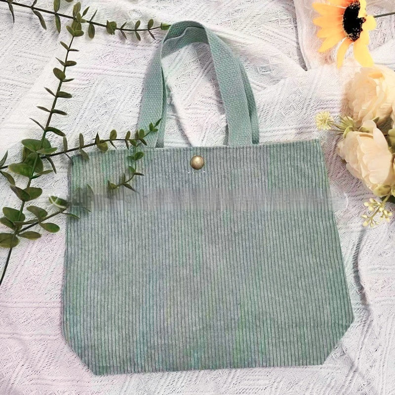 Bolso de lona minimalista de hilo grueso con estampados a doble cara. Un bolso de lona versátil y de gran capacidad para mujer.